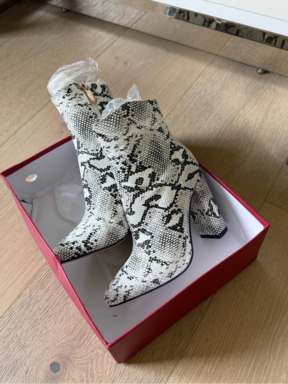Size 6 snakeskin heel booties